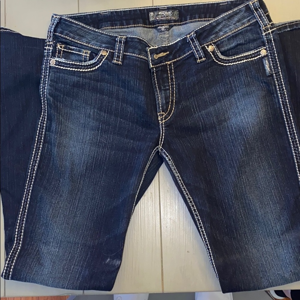 Women’s silver flare jeans size 34 by 33